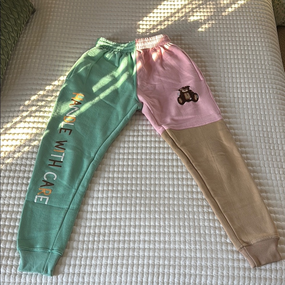 “Handle With Care” color block sweatpants